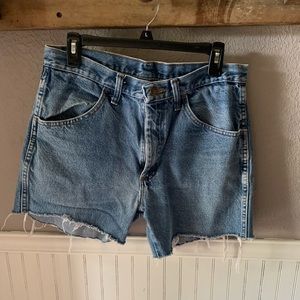 Rustler brand. bought and then cut into shorts from jeans. painted myself